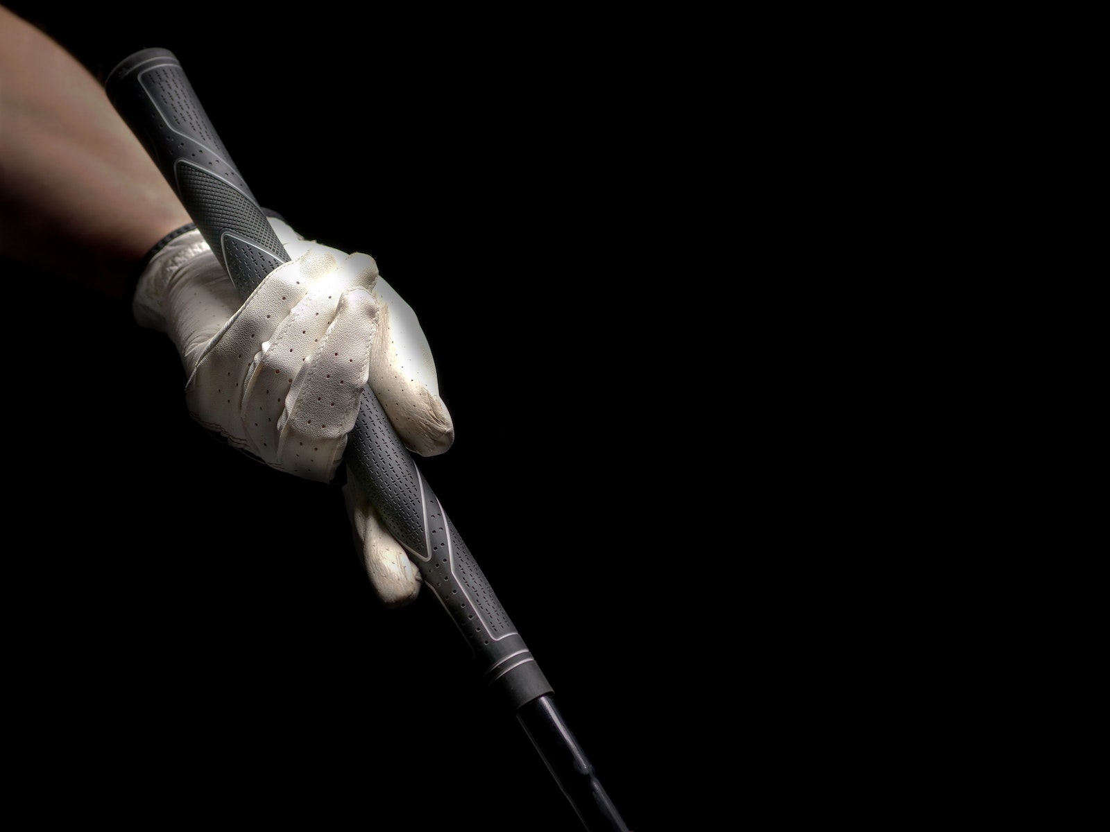 Photo of Person Holding a Golf Club